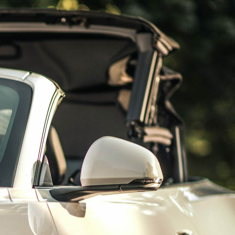 Sunny,Weather,Driving,With,Open,Car,Roof.,Convertible,Road,Trip